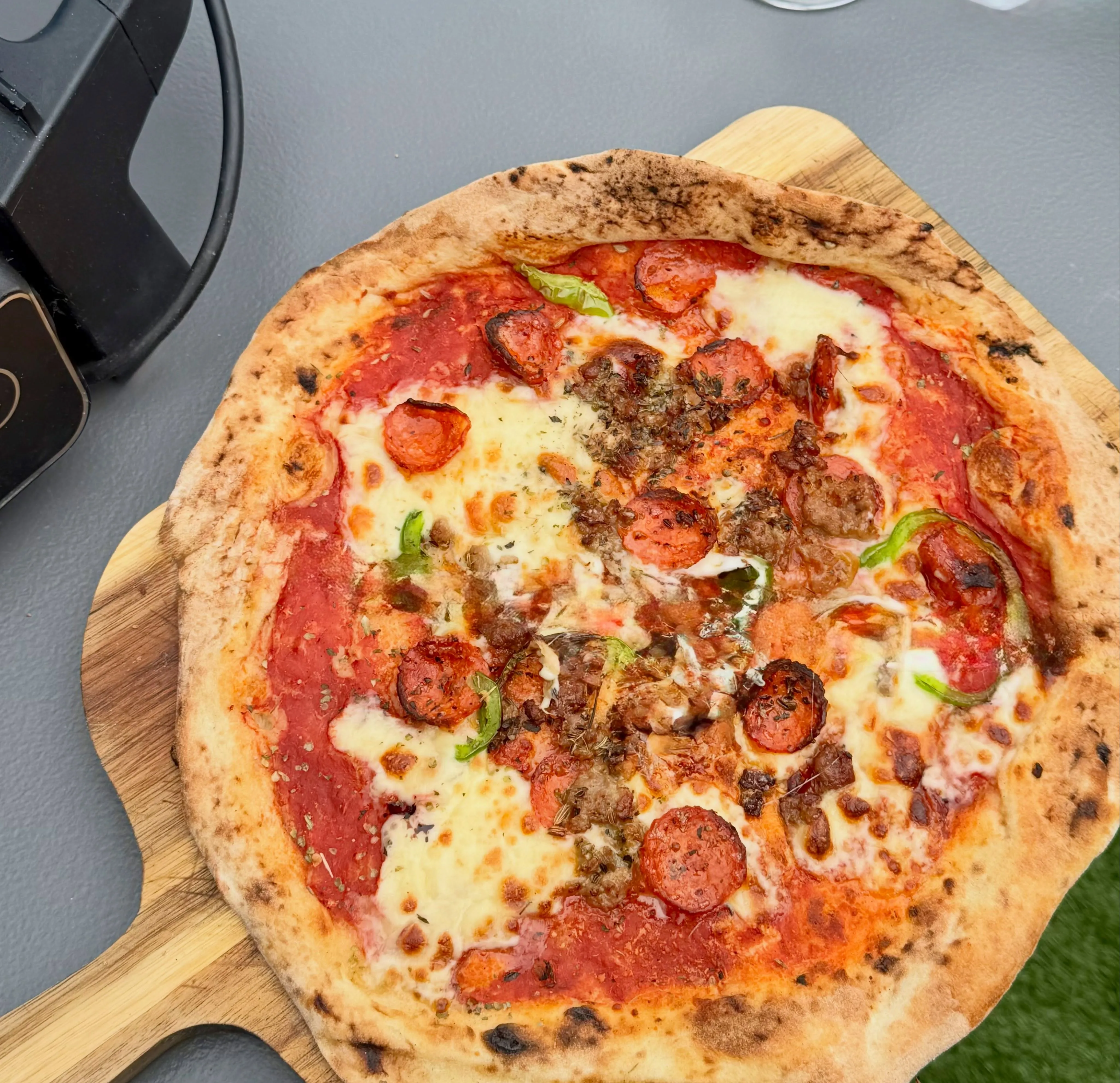 Pizza being served at a social club event